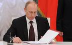 Putin, tartışmalı aile içi şiddete cazai indirim yasasını onayladı