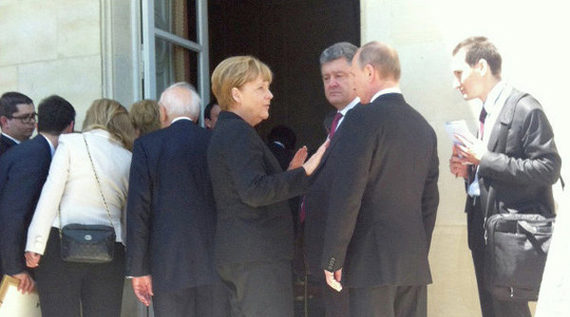Putin, Merkel ve Poroşenko gayri resmi olarak görüştü